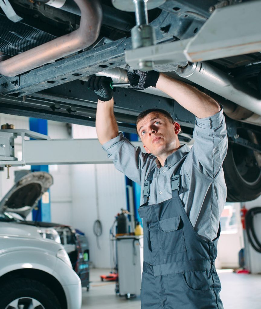 Mechanic underneath a vehicle - Car Repairs Stockton-on-Tees